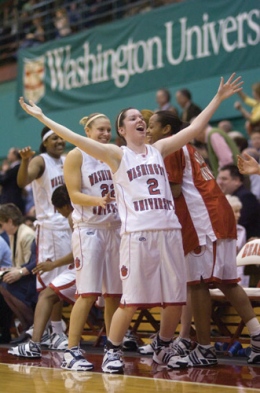 Sophomore Alex Hoover and the rest of the Wash. U. bench celebrate after a three-pointer from Hannah Cusworth gave the Bears a 52-35 lead against NYU on Friday. (Matt Mitgang) 