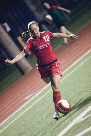 Sophomore Emma Brown readies to kick the ball in a Sept. 12 game against Grinnell College. Brown scored all three of the Bears’ goals this weekend. (Paul Goedeke | Student Life)