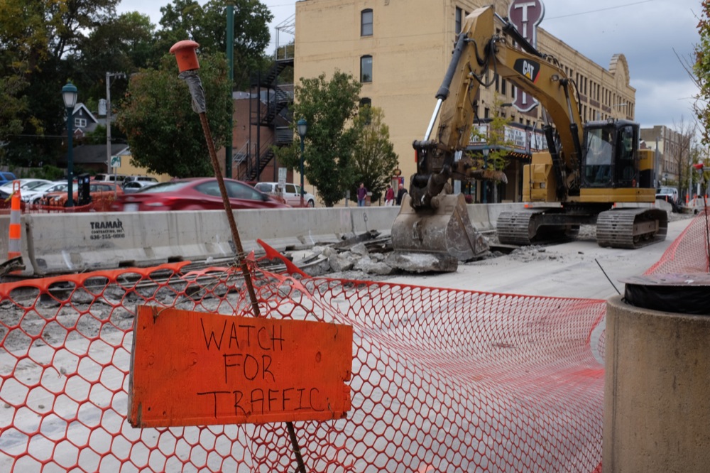 Signs redirect foot traffic in the Delmar Loop as Trolley construction continues. Several businesses including Smoothie King and St. Louis Bread Co. have closed over the past year.