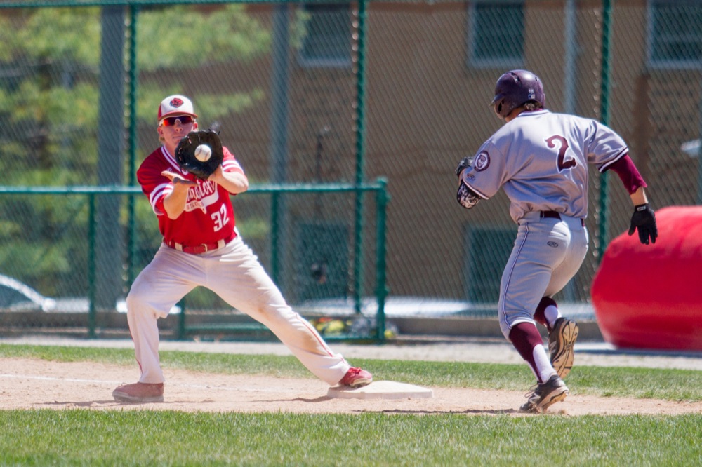 Junior Ben Browdy covers first base in the Bears’ 15-inning win against University of Chicago on Saturday afternoon. The Bears won two of three games in the Alumni Weekend triple-header against University of Chicago.