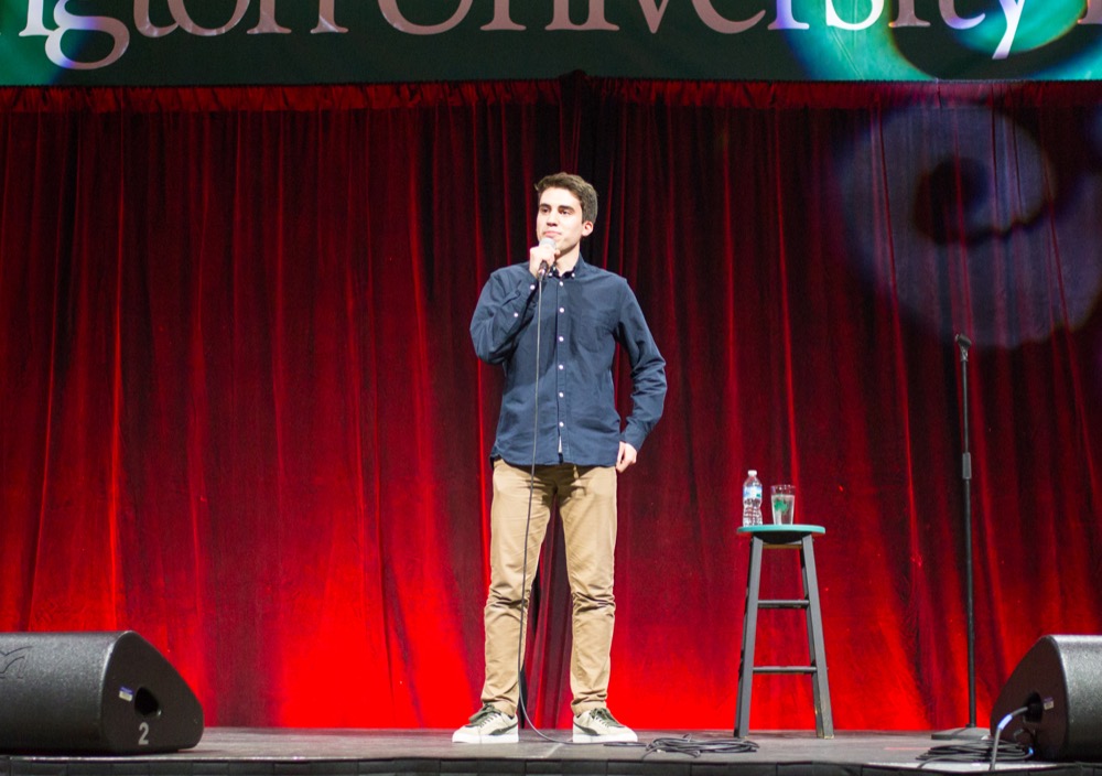Senior Jordan Dubin performs a short stand-up set opening for Ken Jeong in the Field House.
