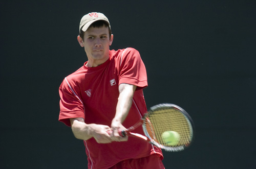 Junior John Watts hits a backhand at a match in the Bear's 5-3 victory over Gustavus Adolphus College in the NCAA Quarterfinals.