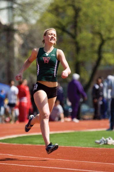 Senior Alli Alberts competes at the Washington University Invitational on April 4. Alberts took first in four UAA events. (Matt Mitgang | Student Life)