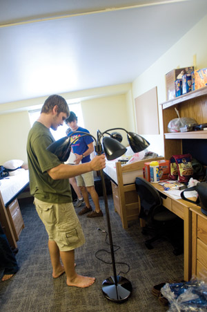 Two newly arrived freshmen unpack and assemble their room on move-in day in August. Washington University ranked fourth in terms of quality of life, according to the 2010 version of an annual survey by The Princeton Review. The survey judges universities on numerous factors, like dorms, food and overall happiness. (Matt Mitgang | Student Life