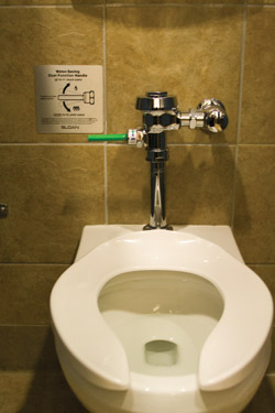 The toilets in the Danforth University Center promote water conservation by having two ways to flush. (Kim Jones | Student Life)
