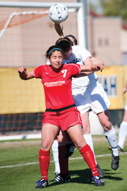 Senior Becca Heymann heads the ball in the national championship game against Messiah College. The Bears fell 1-0 in their program’s first-ever appearance in the national championship game. (Matt Mitgang | Student Life)