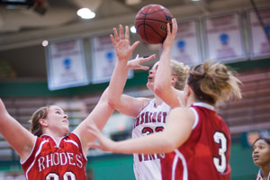 Junior Kelsey Robb goes for a layup against Rhodes College. Robb scored in double figures in both contests this weekend. (Matt Mitgang | Student Life)