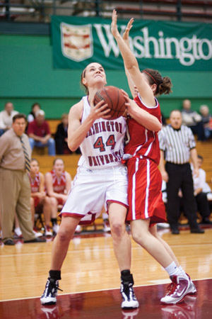 Junior Kathryn Berger moves around a Rhodes College defender in a game on Nov. 29. Berger recorded 13 points and 10 rebounds in Washington University’s 64-57 victory over Carnegie Mellon University on Sunday. (Matt Mitgang | Student Life)