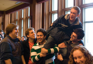 Nick Yozamp is hoised into the air following his Jeopardy! victory on Feb. 12. Yozamp won $100,000 in the final match. (Matt Lanter | Student Life)