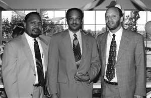 Adriel Johnson (center) with Wash U friends Mike White ‘79 and Rommie Loudd ‘79. (Courtesy of Sheldon Ames)