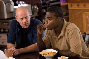 Tracy Morgan, right, as Paul, and Bruce Willis, as Jimmy, star in Warner Bros. Pictures crime comedy “Cop Out.” (Warner Bros. | MCT)