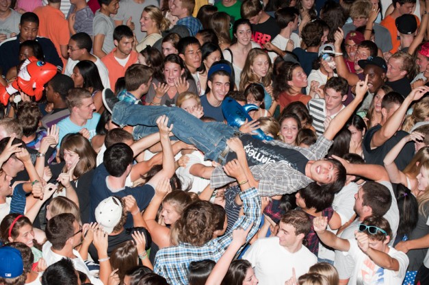 A student crowd-surfs at Club 40.