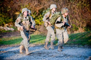 Then junior Rachel Atkins (left) runs toward the finish of the 10k road march at Ranger Challenge last year. 