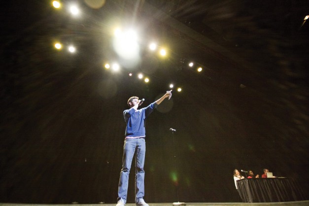 Host George Watsky performs an original poem Friday night to open the third annual Grand Slam in Edison Theatre. The event, hosted by WU-SLam, packed the 627 seats of the Edison and drew over 1800 live viewers around the world, according to Kuumba.tv, which hosted an online broadcast of the slam.