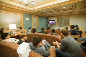 Students gather in the common room on the first floor of Gregg Hall to watch the State of the Union address delivered by President Barack Obama on Tuesday. The College Democrats hosted the viewing party.