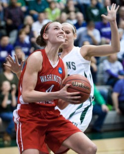 Senior Kathryn Berger looks for a shot against Illinois Wesleyan University in the national semifinal game on Friday night. Berger's 28 points led the Bears past the Titans 87-77 to send the Bears to the championship game against Amherst College on Saturday.