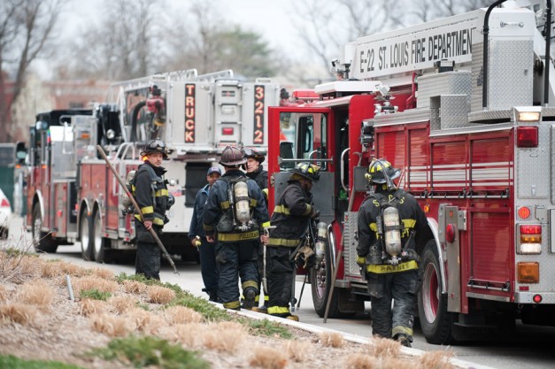 St. Louis Fire Department firefighters pack away equipment outside of Brauer Hall early Tuesday afternoon. At least nine fire trucks from three departments responded after a mishap with a reaction experiment in an Environmental Nanochemistry Lab led to a 911 call. There were no injuries.