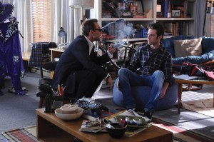 Contra Security head  Oz (Christian Slater, left) attempts to convince Cameron (Bret Harrison, right) to join the team in the new half-hour comedy Breaking In premiering Wednesday, April 6 at 8:30 p.m. CST on FOX.