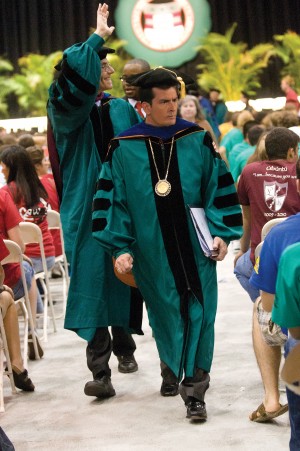charlie2 Charlie Sheen is so excellent at winning that he already had a photo shoot of what it will look like when he receives an honorary degree, even though he won’t actually come to Washington University until May.