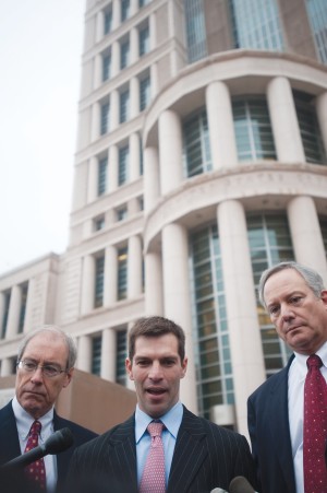 Former state senator Jeff Smith, flanked by his lawyers, speaks to the media after being sentenced to 12 months in federal prison and a $50,000 fine in November 2009. Smith plead guity to two counts of conspiracy to obstruct justice.