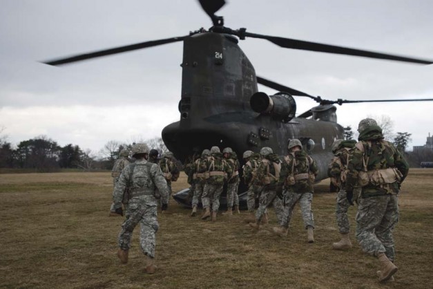 Members of Gateway battalion board a CH-47 Chinook of the Illinois Army National Guard for transportation to their weekend training exercise. Gateway battalion consists of ROTC cadets from local St. Louis schools, including Washington University.