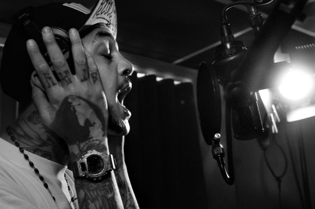 Travis McCoy, 28, the lead singer/songwriter of Gym Class Heroes, works on a new track.