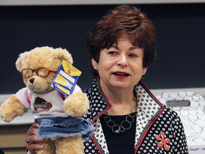 Build-A-Bear founder Maxine Clarke displays a Washington University-themed stuffed bear. Clarke gave the bear to the Wash. U. Entreneurship Club after offering insight into the entrepreneurial experience.