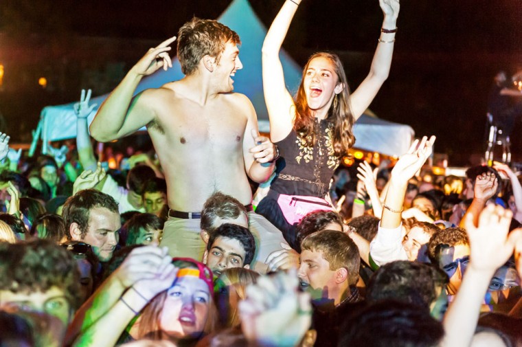 Two students dance on the crowd’s shoulders during Icona Pop’s performance at this year’s Fall WILD. 