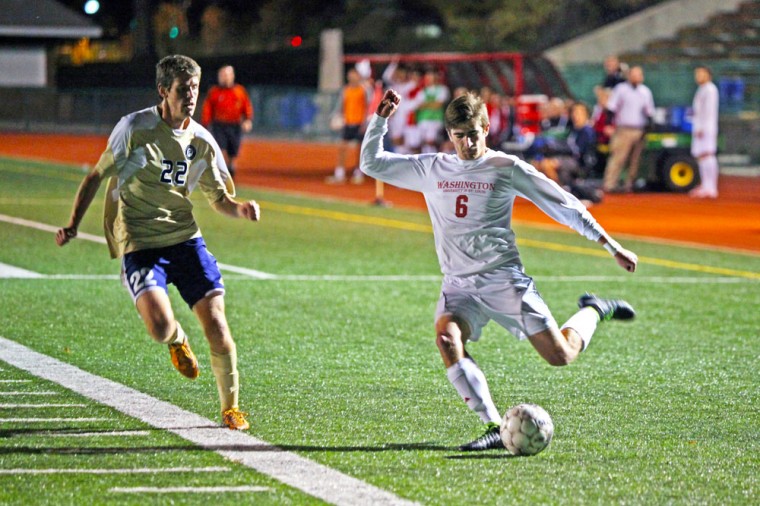 Junior midfielder Jack West crosses the ball against Pricipia College on Thursday night at Francis Field. West scored two goals to lead the Bears to a 4-0 victory, giving him a team-high seven on the season.