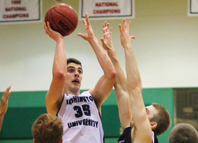 Then-junior forward Matt Palucki shoots against New York University in a Washington University victory on Jan. 19, 2014. Palucki is the top returning scorer and rebounder for the Bears, and he totaled 33 points and 27 rebounds in the team’s first two games this season.