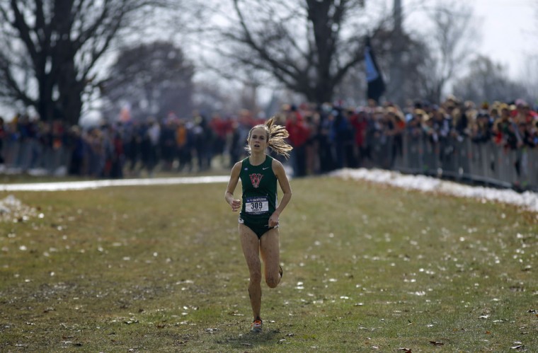 Senior Lucy Cheadle runs alone in second place at Saturday’s Division III Cross Country National Championships. Cheadle earned her fourth consecutive All-American honors, becoming just the 13th woman in Division III history to do so, as she led the women’s cross-country team to a fourth-place team finish.