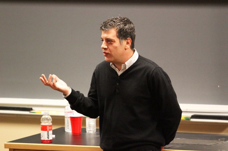 Writer Sayed Kashua speaks in Brown Hall on Thursday night after a campus-wide protest regarding the non-indictment of Darren Wilson.  His talk centered around his experiences of being a minority and how it has affected his cultural identity.
