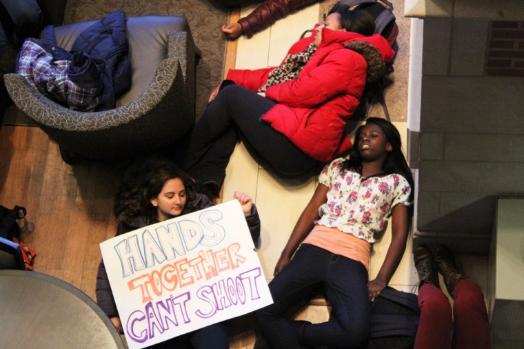 Students engage in a dead-in display in the DUC, where they lay on the ground for 4 1/2 minutes in silence to commemorate the number of hours Michael Brown lay dead in the street.