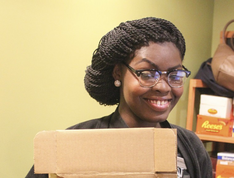 Student favorite Merissa Robinson poses in Paws & Go on the South 40. She will be leaving the on-campus grocery store at the end of this week for a new job at General Motors.