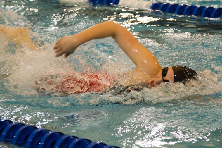 Junior Kristalyn McAfee swims in the women’s 800-free relay on Friday at the NCAA Swimming and Diving Championships in Shenandoah, Texas. The relay team finished third and recorded a time of 7:20.35, breaking the school record by more than five seconds.