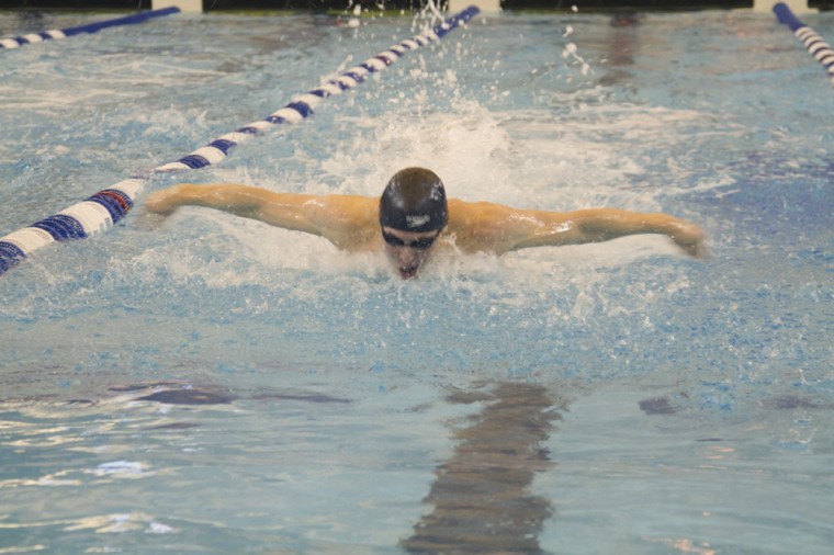 Junior Reed Dalton swims in the 100-yard butterfly race on Thursday at the national championship in Shenandoah, Texas. Dalton won the event with a national-record time and earned All-America honors in the event for the third straight year.