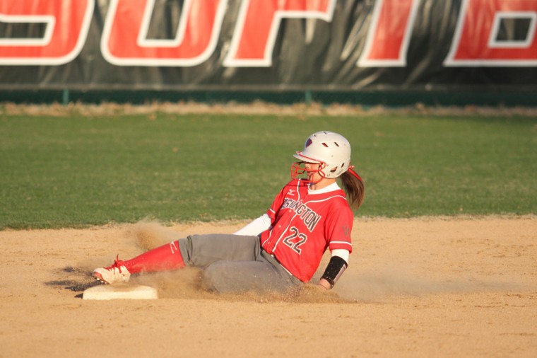 Sophomore outfielder Janet Taylor slides safely into second base against Illinois Wesleyan University on Sunday afternoon in a Mizuno Invitational game. Taylor recorded a hit and scored a run in a 6-5 loss to IWU as the the Bears’ weekend record fell to 2-2.