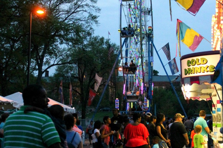 Community members walk around the Brookings parking lot for food and rides at this year’s ThurtenE Carnival. Many Greek Life organizations helped sponsor the event and built facades showcased at the yearly carnival. 