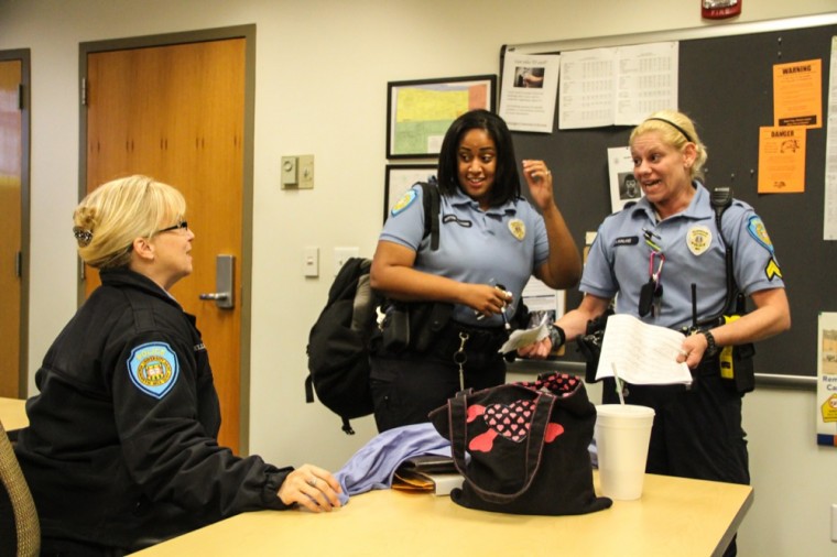 Washington University Police Department officers talk about focus areas at a nightly meeting in September 2014. In wake of recent school shootings, WUPD and the Emergency Response Team have detailed their preparation plans on campus.
