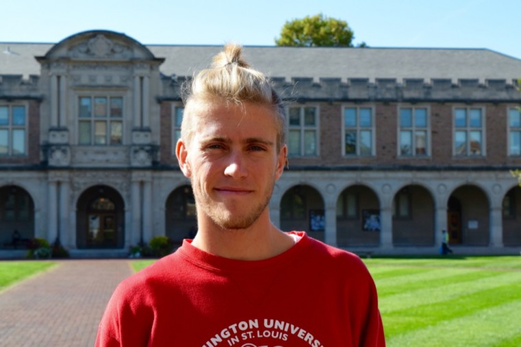 Junior Ryan Becker, a top runner for Wash. U. cross country, poses in Brookings Quadrangle. Becker began running in high school after an injury forced him to stop playing tennis.