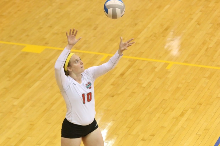 Zastrow prepares to serve in the Bears’ game against Cornell College on Sept. 12. During her time at Wash. U., Zastrow has played right side, setter, defensive specialist and middle on the volleyball team.