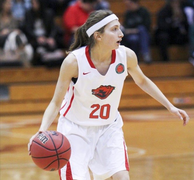 Guard Natalie Orr dribbles down court on Friday night in the Bears’ win against Case Western. Orr led the team in points with 23 and went five for ten in three-pointers.