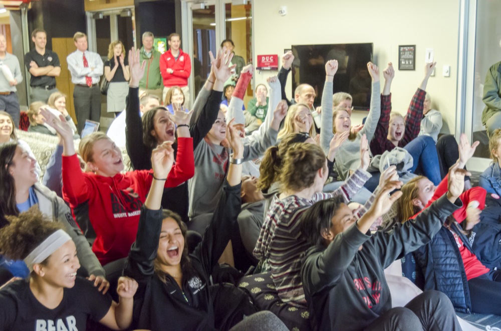 Womens’ basketball celebrates their selection into the NCAA Division 3 tournament in the Danforth University Center Fun Room. The Bears will face Greenville College in the first round at home this Friday at 7:30pm. 