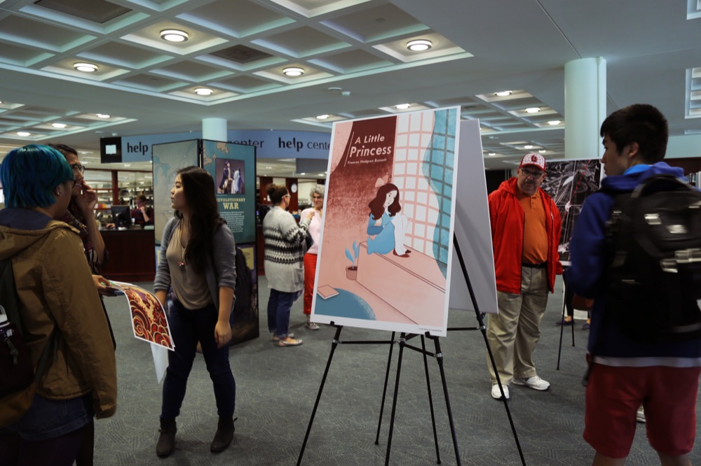 Students view a re-designed book cover for "A Little Princess." The 50x50 project has been in other states besides Missouri, such as New York and Colorado.