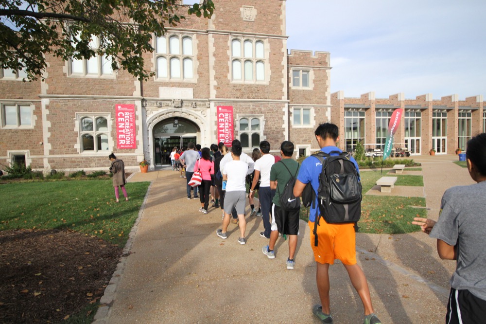Students wait in line for the grand opening of the Gary M. Sumers Recreation Center on Saturday morning.