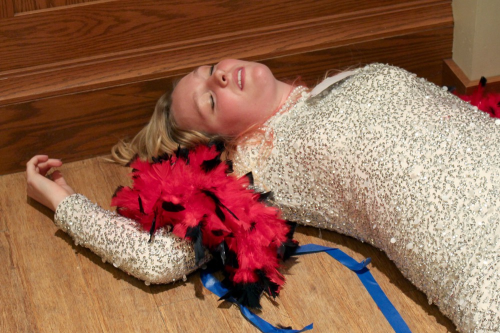 A student plays dead. All Student Theatre presented “Cruising for Murder!” on Oct. 22.