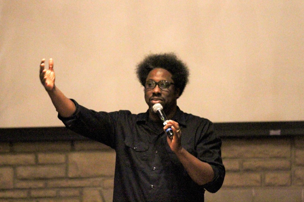 W. Kamau Bell speaks to the audience gathered inside College Hall on Wednesday, Oct., 26. The political comedian was brought to campus by Congress of the South 40.