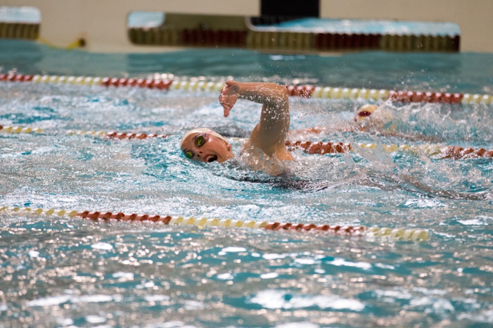 A swimmer on Wash. U.’s women’s team swims aganist the University of Chicago. The Bears will travel to Chicago next for the Midwest Invite, which is preparation for the NCAA championships.