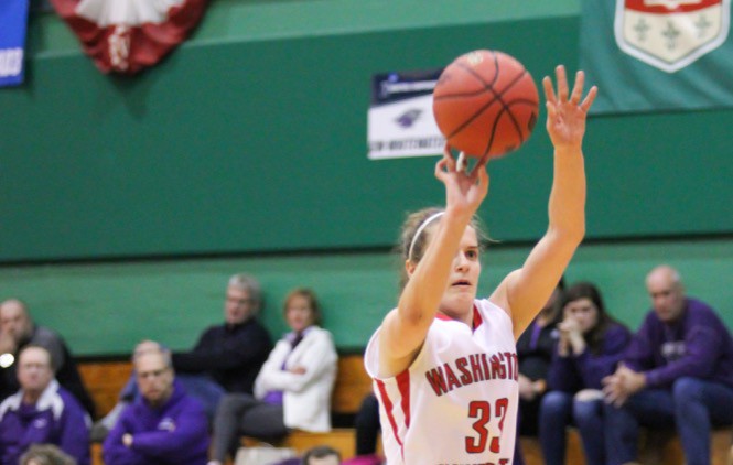 Senior forward Zoe Vernon shoots the ball aganist Wisconsin- Whitewater. Wash. U. defeated Emory this weekend 82-78.