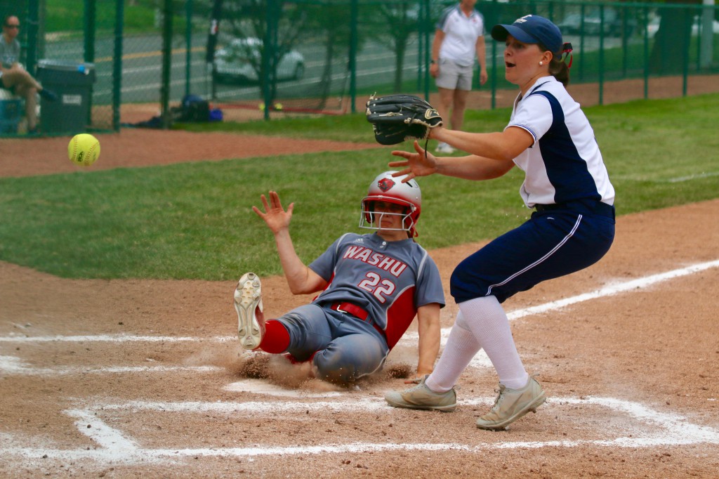Senior Janet Taylor slides into home base before the opponent player catches the ball. The softball team split a four game-series against Case Western Reserve University this weekend.
